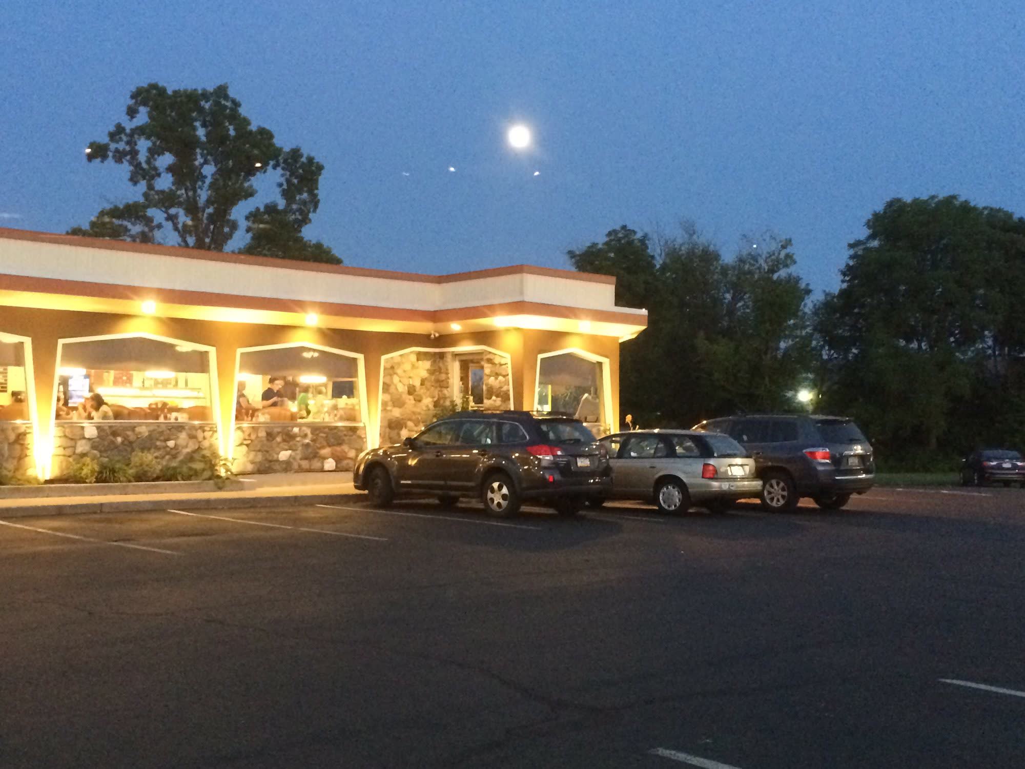 Lancers Diner lit up at dusk, seen from the parking lot on Easton Road